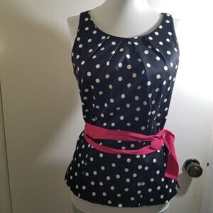 White House Black Market brand polka dot top in black with pink belt, size 2
